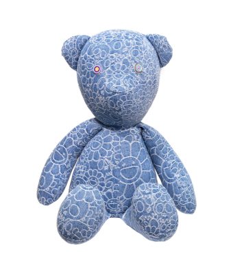 Blue teddy bear with Murakami-inspired floral and skull patterns, plush and collectible art toy.