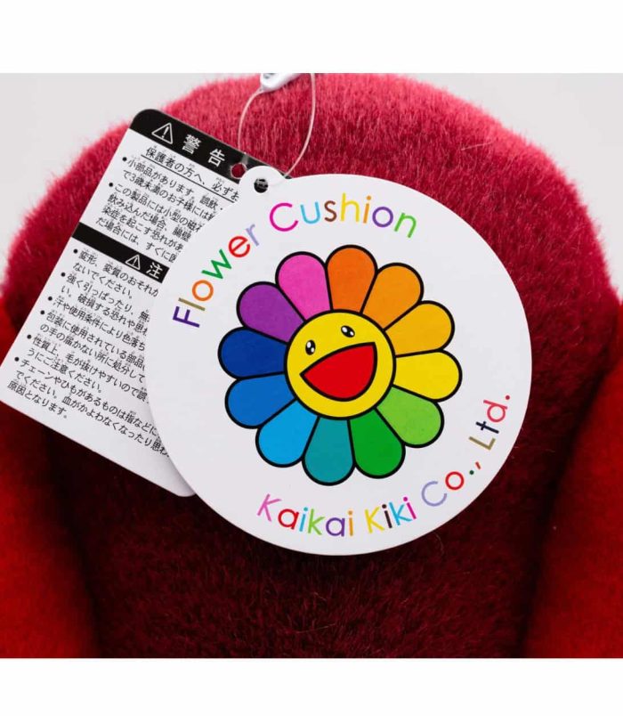 Takashi Murakami Flower Cushion Pillow Plush Bright red flower cushion with Murakami-inspired smiley face design.