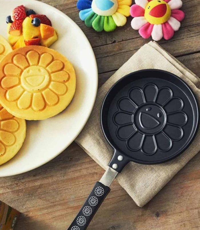 Flower Pancake Maker - Takashi Murakami Black Handle Flower-shaped pancake maker with black handle, inspired by Takashi Murakami's art.