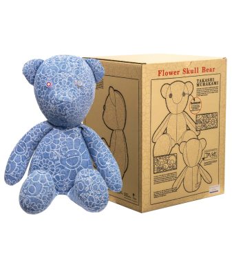 Cute blue teddy bear with Murakami-inspired floral and skull patterns, collectible art toy.