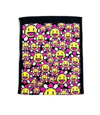 Vibrant Takashi Murakami 108 Flowers towel with pixel art smiley faces in yellow, pink, and black.