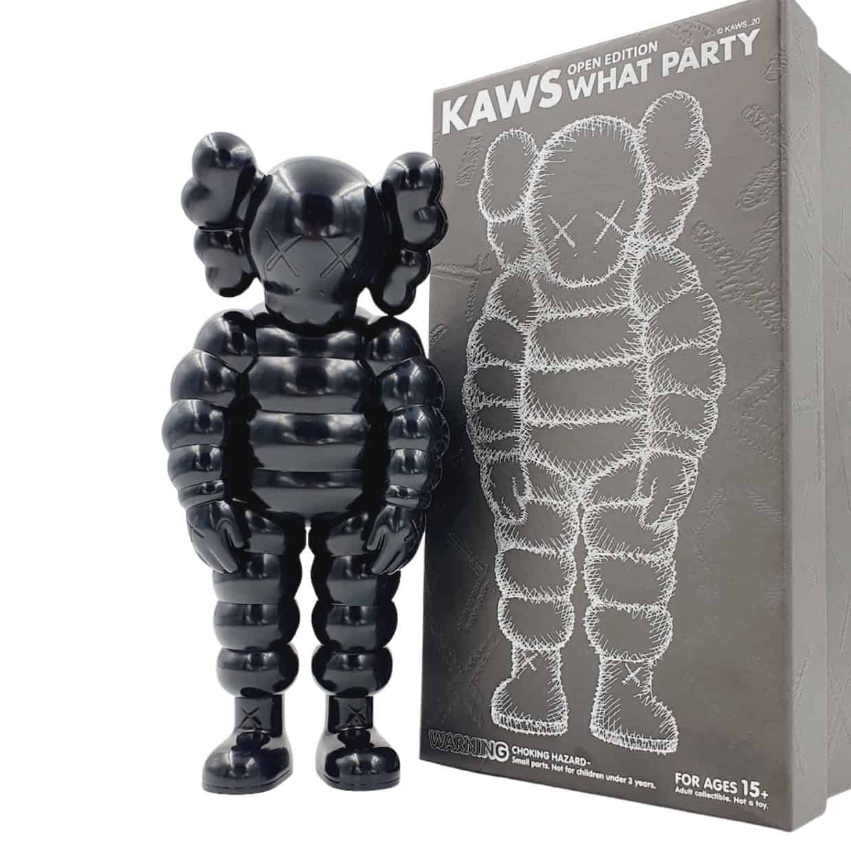 Black KAWS Companion figure with box, collectible designer toy.