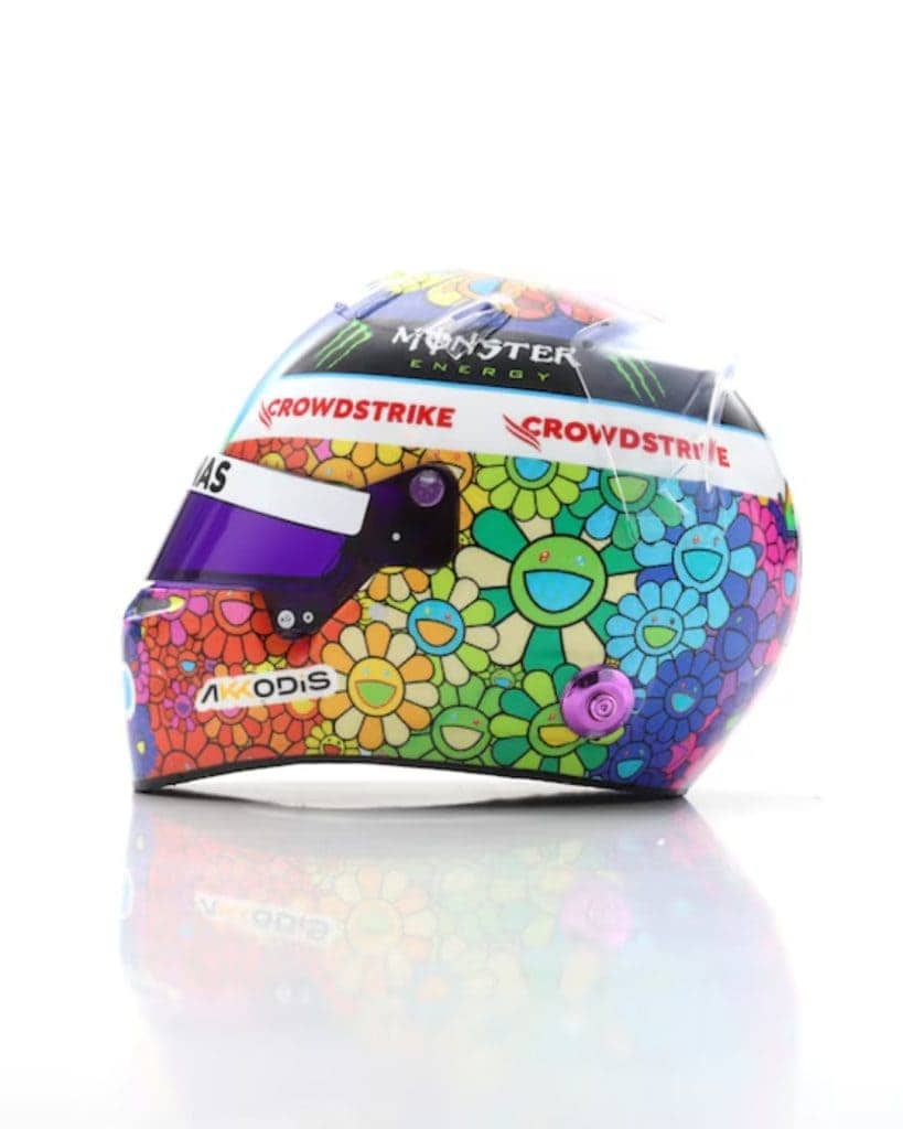 Miniature helmet featuring a colorful floral design by Takashi Murakami, inspired by Lewis Hamilton'.