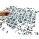 Colorful Murakami Flowers jigsaw puzzle with 900 pieces, featuring vibrant floral artwork.
