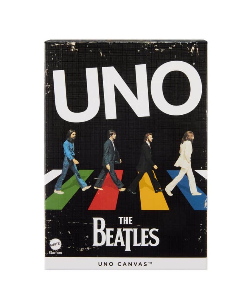 UNO The Beatles card game on canvas featuring iconic band members.