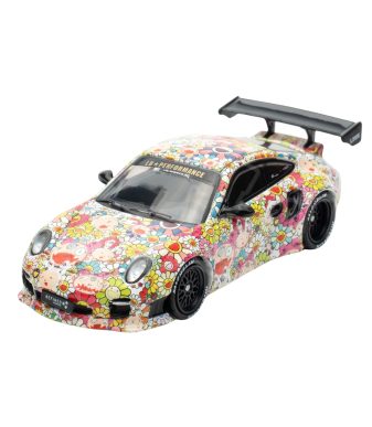Colorful floral-wrapped Porsche 911 race car for collectors and enthusiasts.
