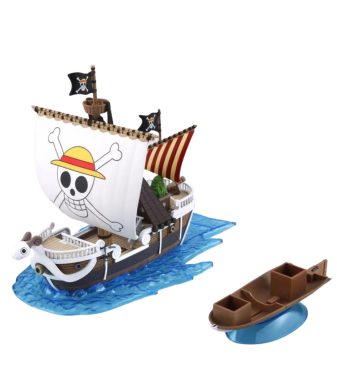 Detailed One Piece Going Merry ship model kit with pirate flags and ocean base.