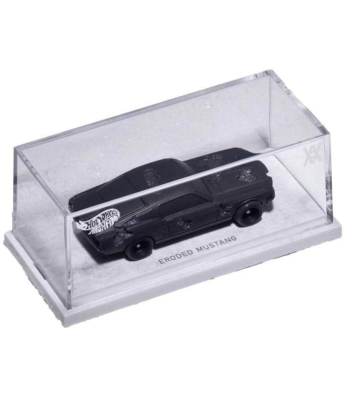 Eroded Mustang Hot Wheels Car Eroded Mustang Hot Wheels die-cast car in display case.