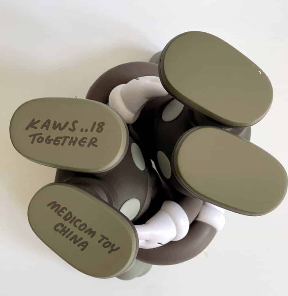 Detailed view of Kaws x Medicom Toy collectible figures.