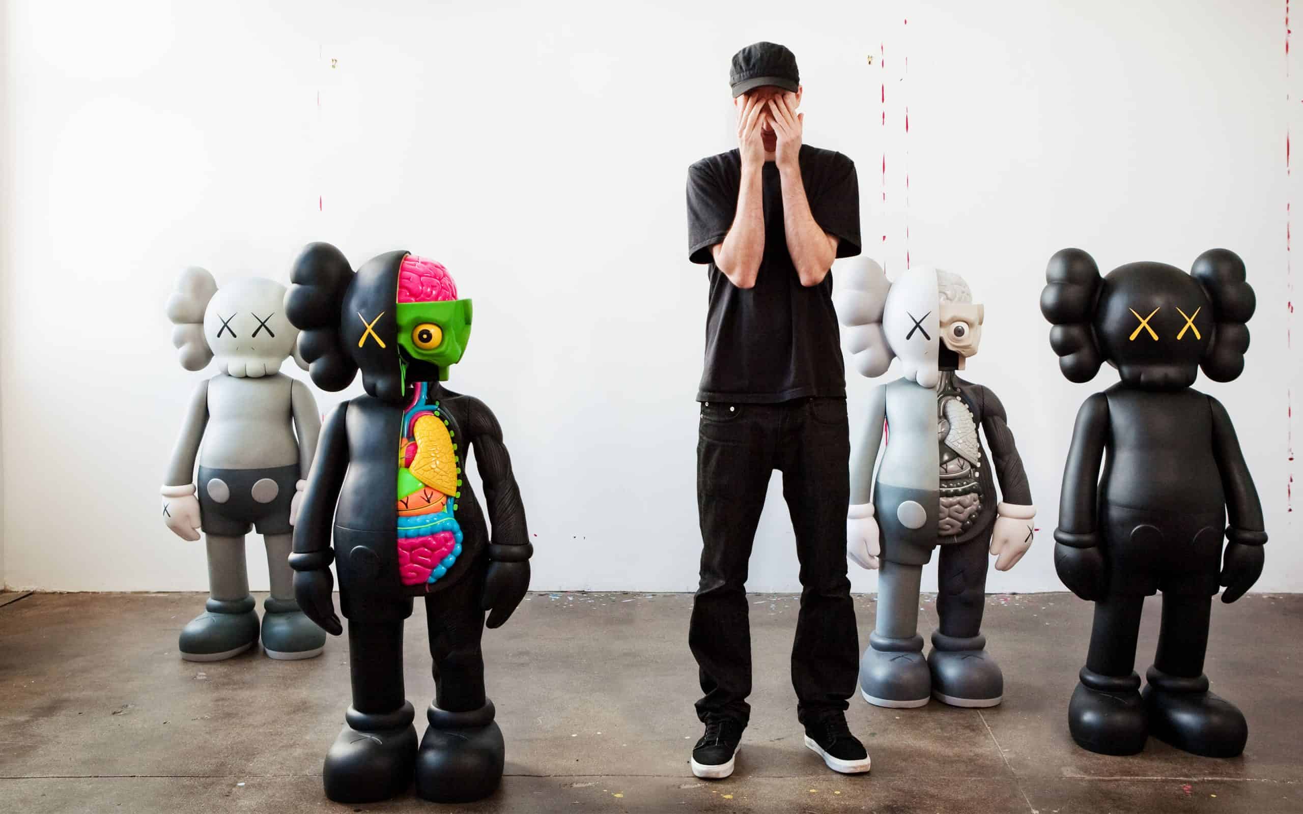 Collection of KAWS Companion art toys with vibrant designs and unique features displayed in an art g.