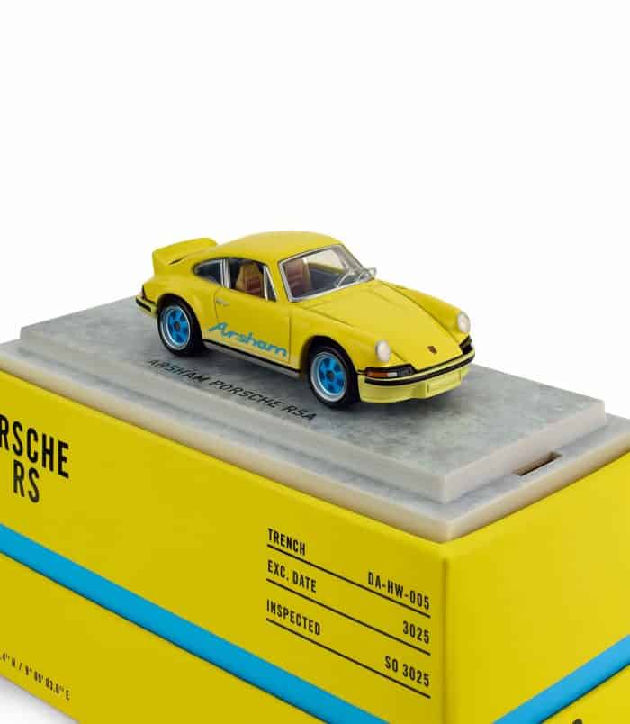 Porsche 911 RS Model Car Detailed Porsche 911 RS diecast model on display.