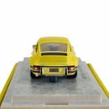 Classic yellow Porsche diecast model with detailed features and authentic design.