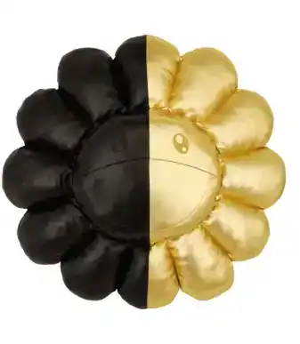 Plush flower pillow with black and gold halves, soft and decorative for home decor or gifts.