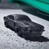 Vintage black toy car with detailed features, perfect for collectors and enthusiasts.
