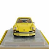 Yellow Porsche 911 model car on display at Rare Inventory.