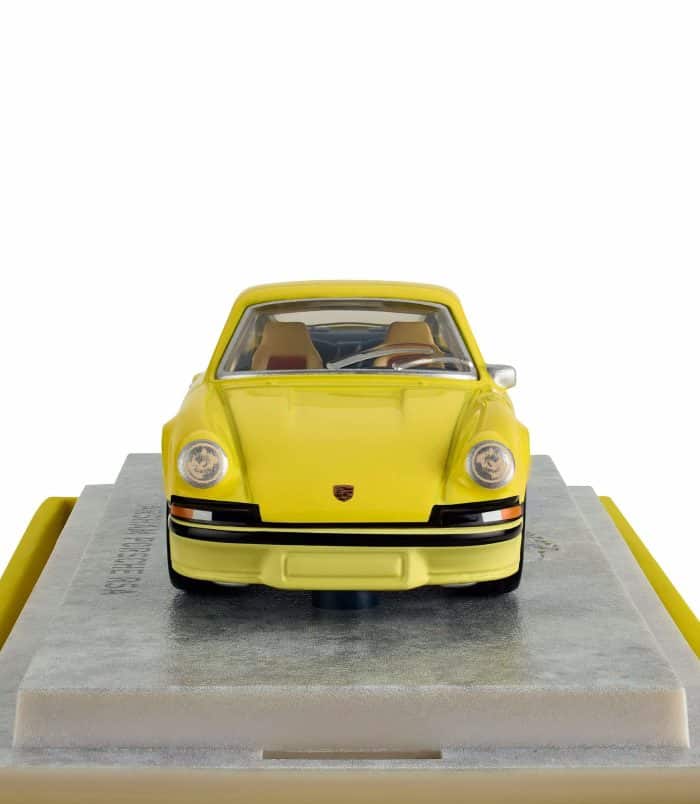 Yellow Porsche 911 model car on display at Rare Inventory. Yellow Porsche 911 model car on display at Rare Inventory.